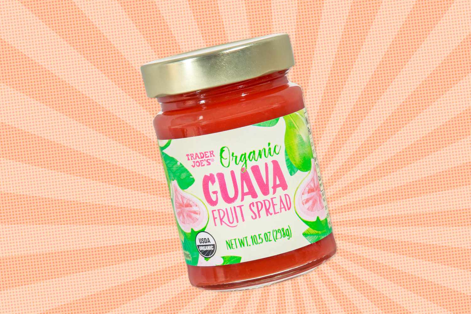 Jar of Trader Joe's organic guava fruit spread with decorative background
