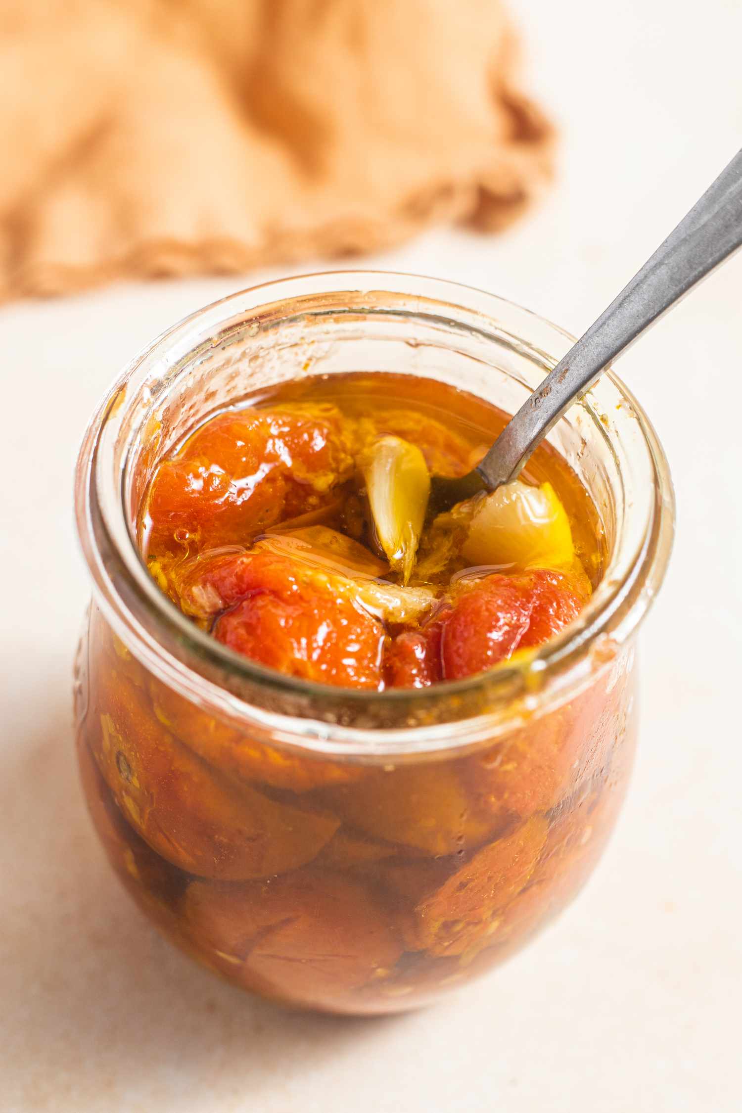 Tomato Confit in a Jar with a Spoon