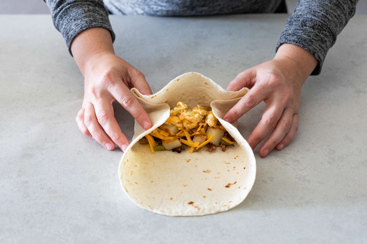Bottom Folded over the Sides and Filling, Initiating the Burrito Roll