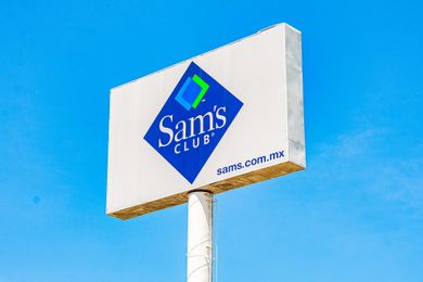 Billboard with Sams Club logo and website URL in an outdoor location