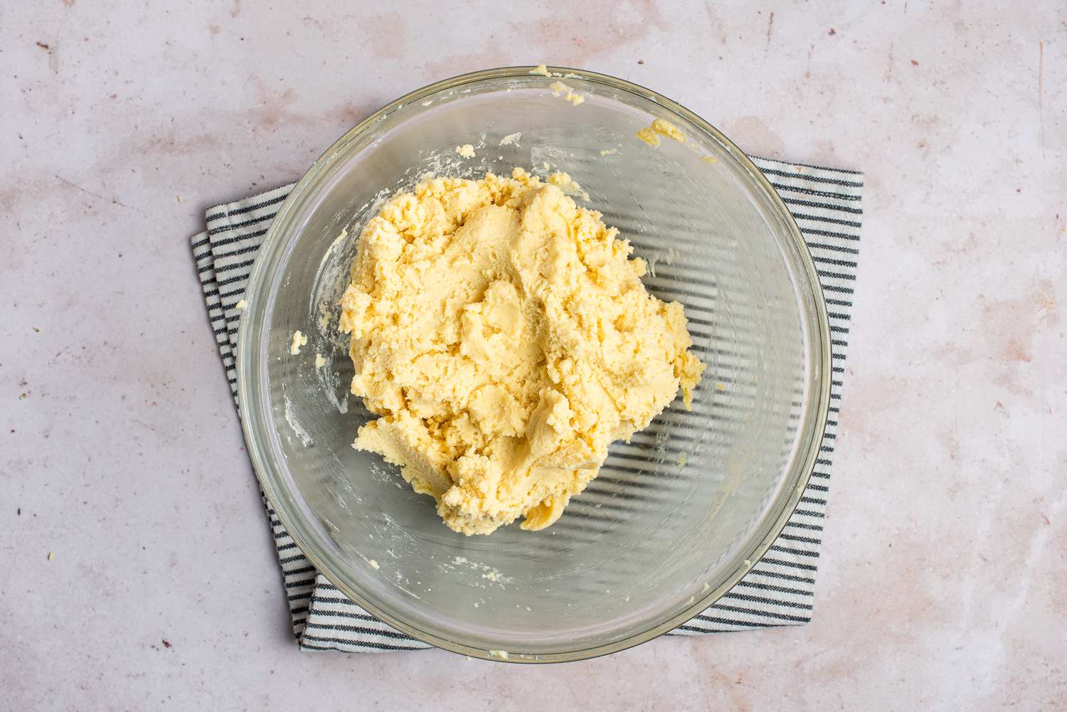 Thumbprint cookie dough in a glass bowl