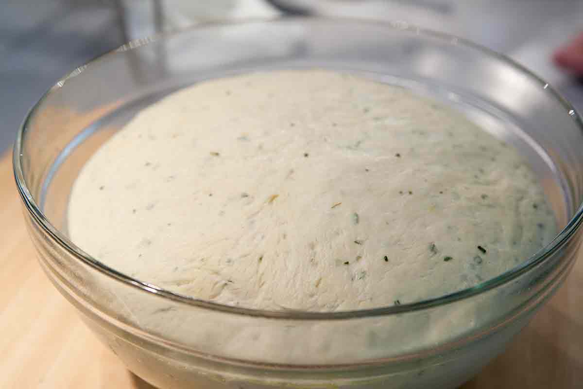 Dough for focaccia bread after rising and doubled in bulk