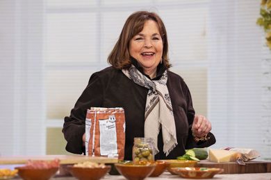 Ina Garten preparing food on a kitchen counter