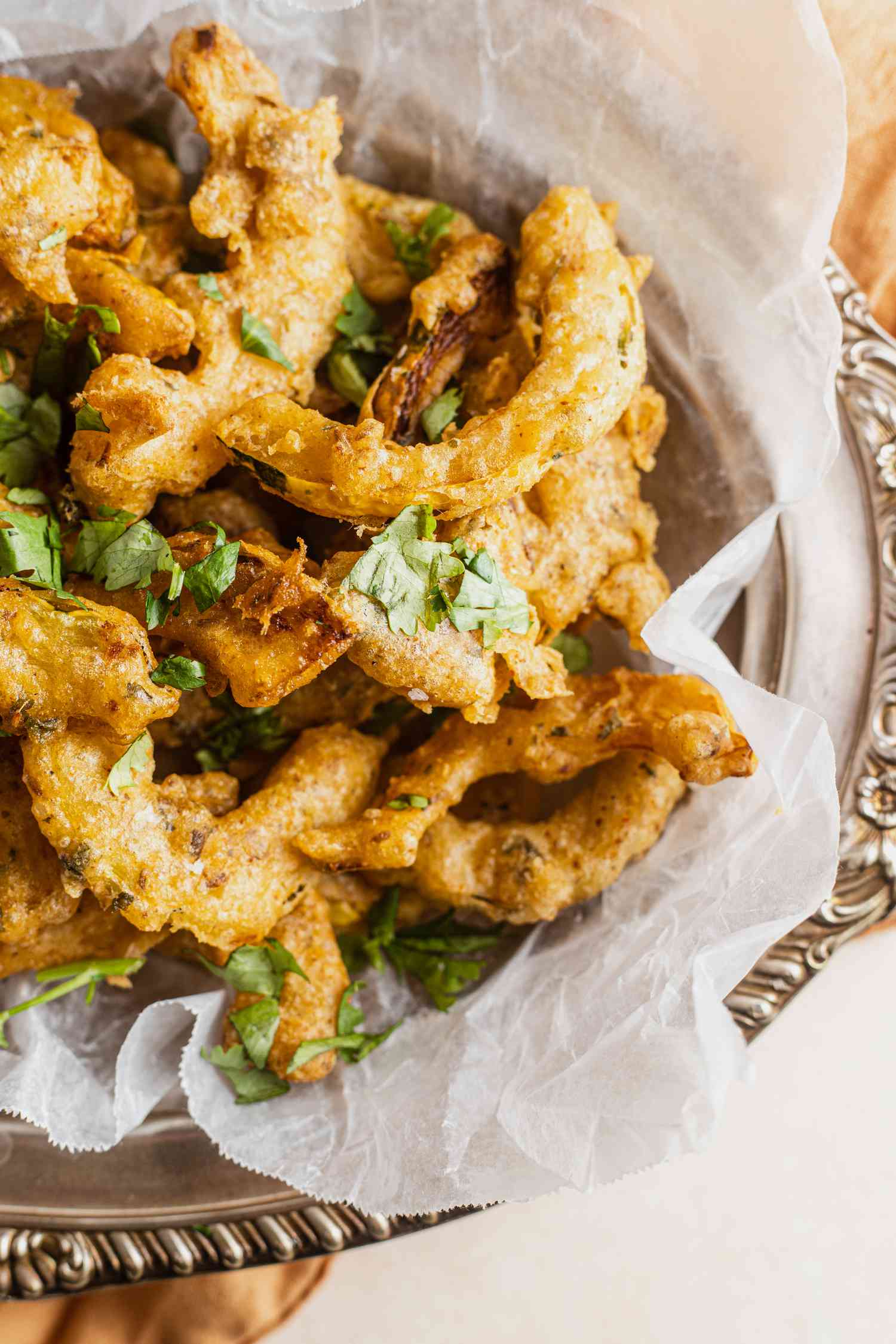 Platter of Delicata Squash Pakoras Topped with Chopped Cilantro 