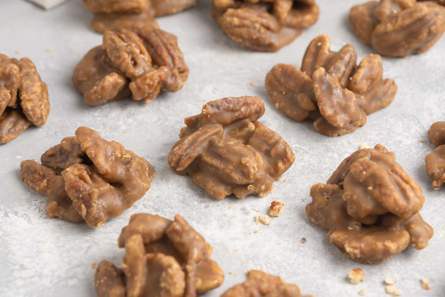 Pecan pralines on parchment paper.