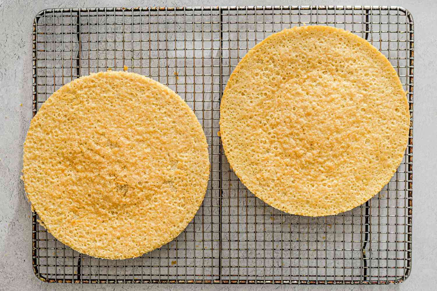 Baked cakes cooling on rack.
