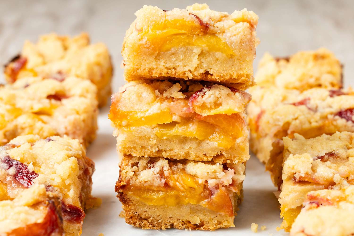 Peach pie bars stacked on top of each other 