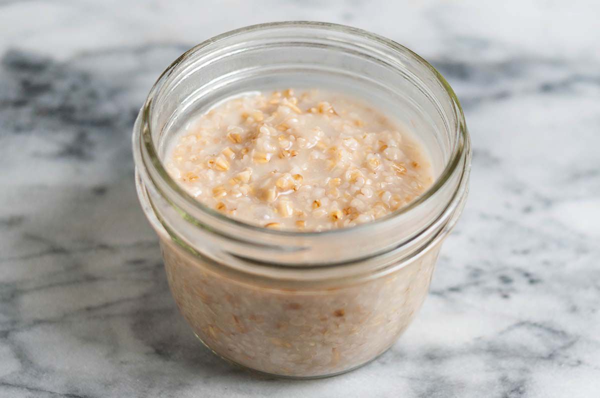 A jar of thickened steel cut oats, ready to eat