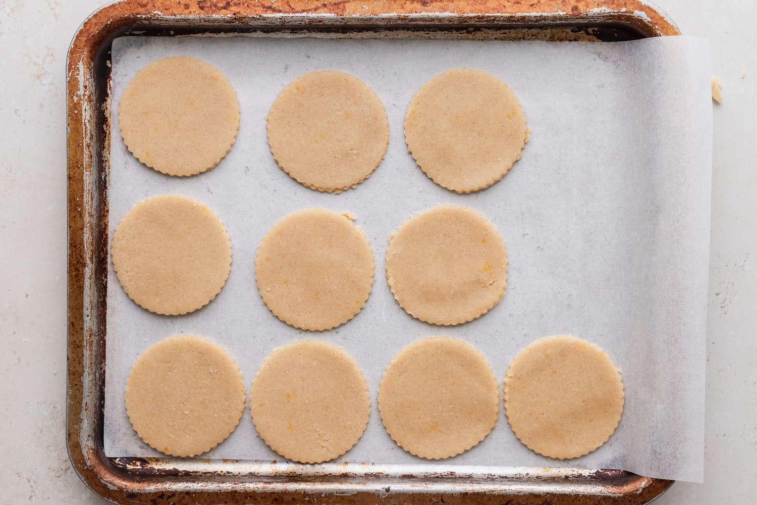Overhead view of unbaked cookie rounds to make classic linzer cookies.