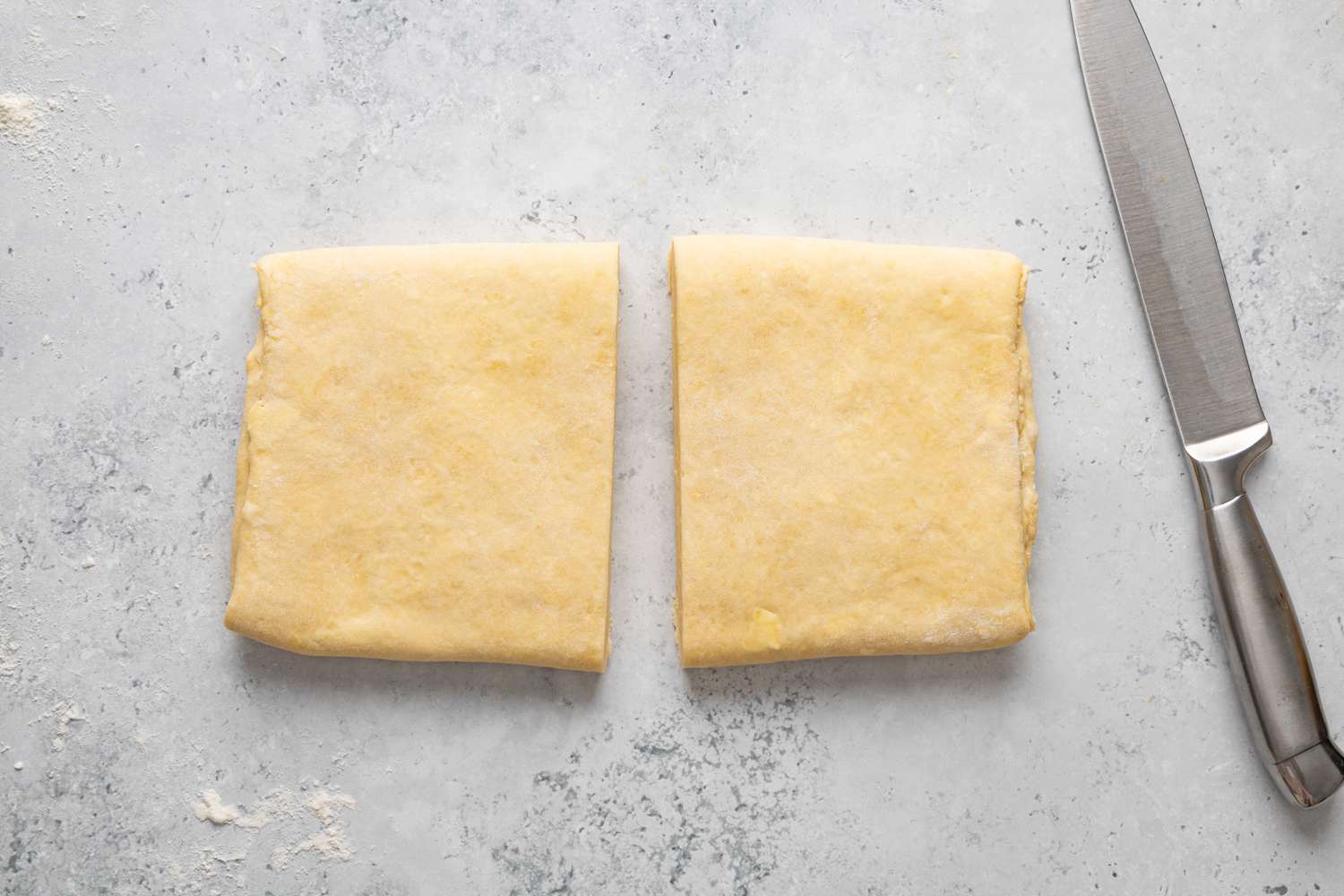 Folded Homemade Crescent Roll Dough Cut in Half 