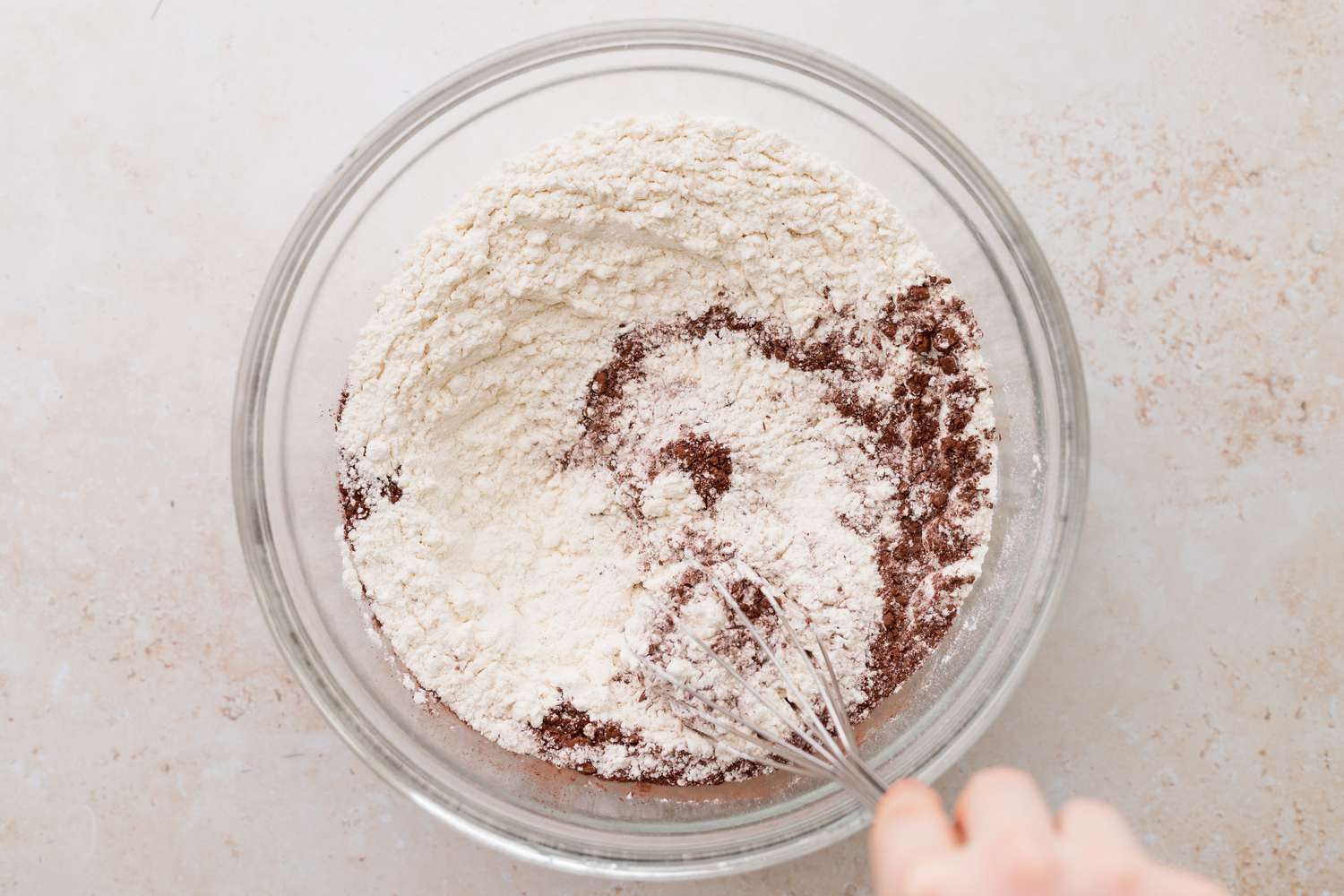 Stir dry ingredients for red velvet cake 