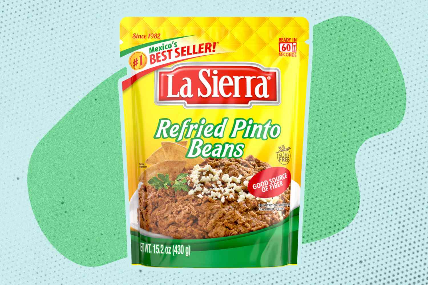 Package of La Sierra Refried Pinto Beans on a patterned background