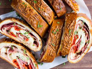 Slices of homemade stromboli on a cutting board
