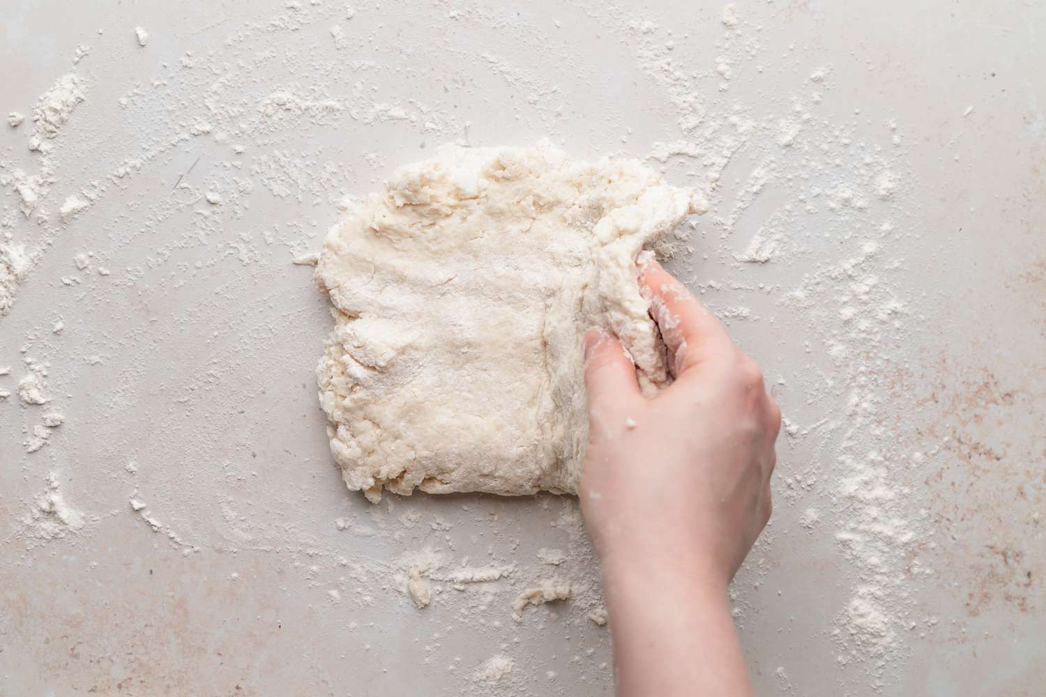 Biscuit dough on a counter to make homemade biscuits and gravy
