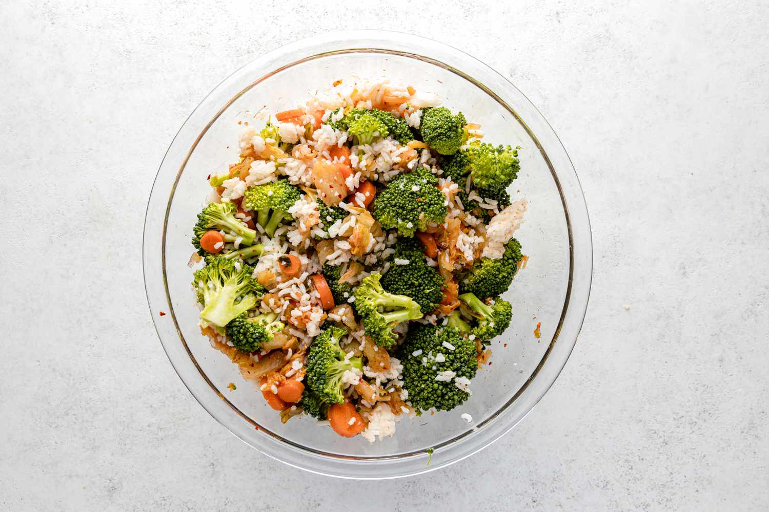 Bowl of Sheet Pan Fried Rice Ingredients Mixed Together