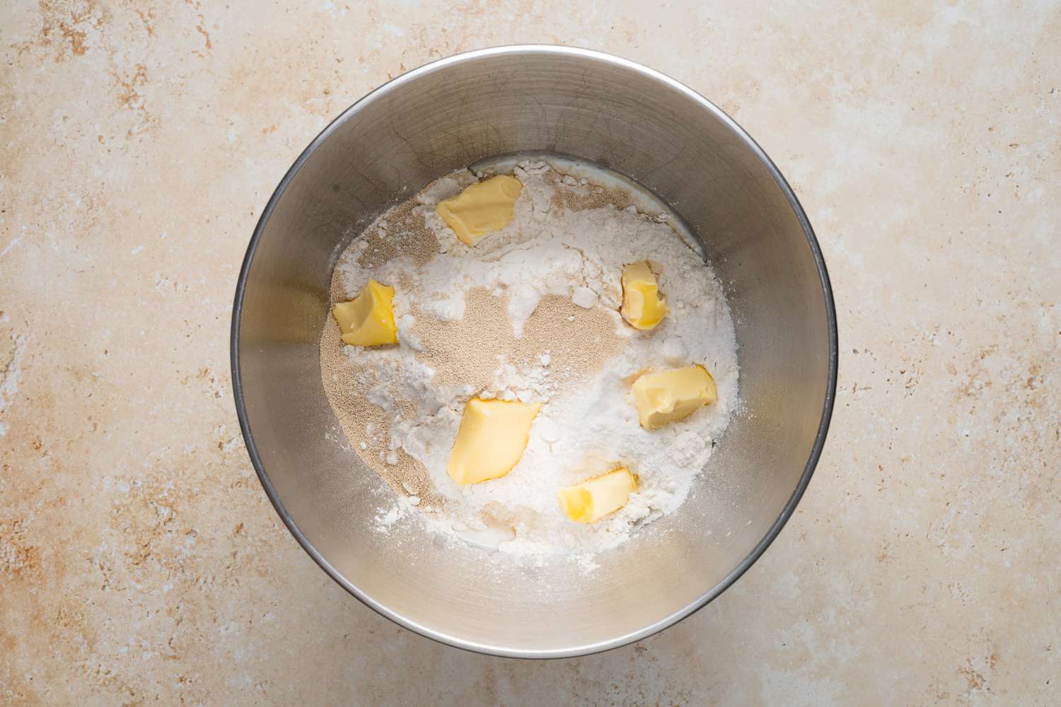 Mixer Bowl with Butter, Yeast, Sugar, and Flour