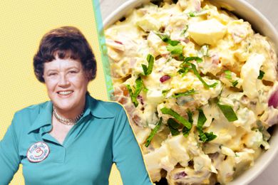 Julia Child next to a bowl of potato salad