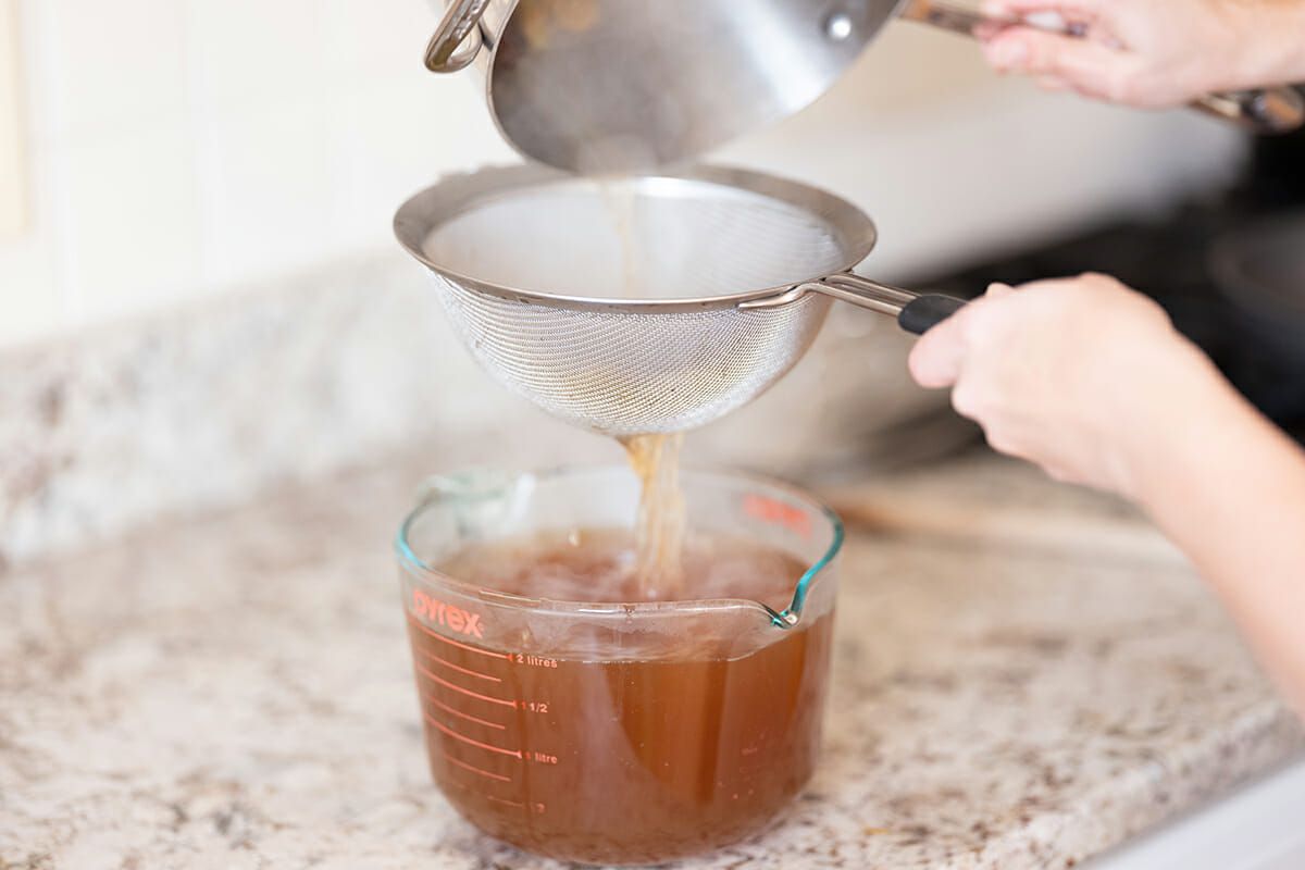 Easy Beef Pho strain the broth