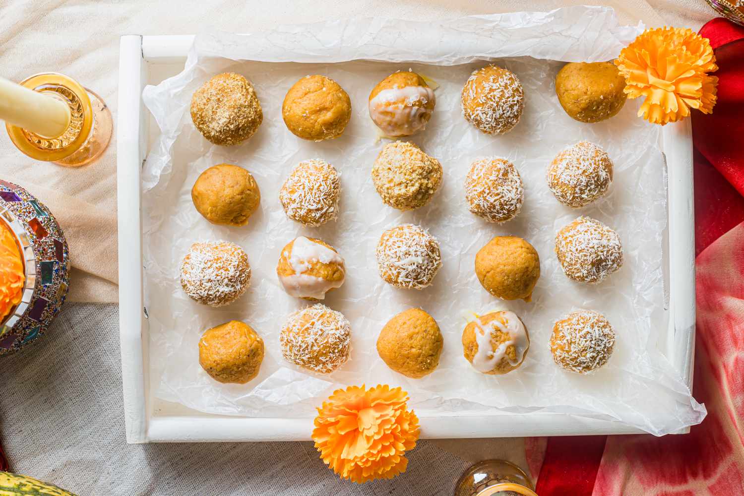 Pumpkin Ladoo on a Tray with Flowers