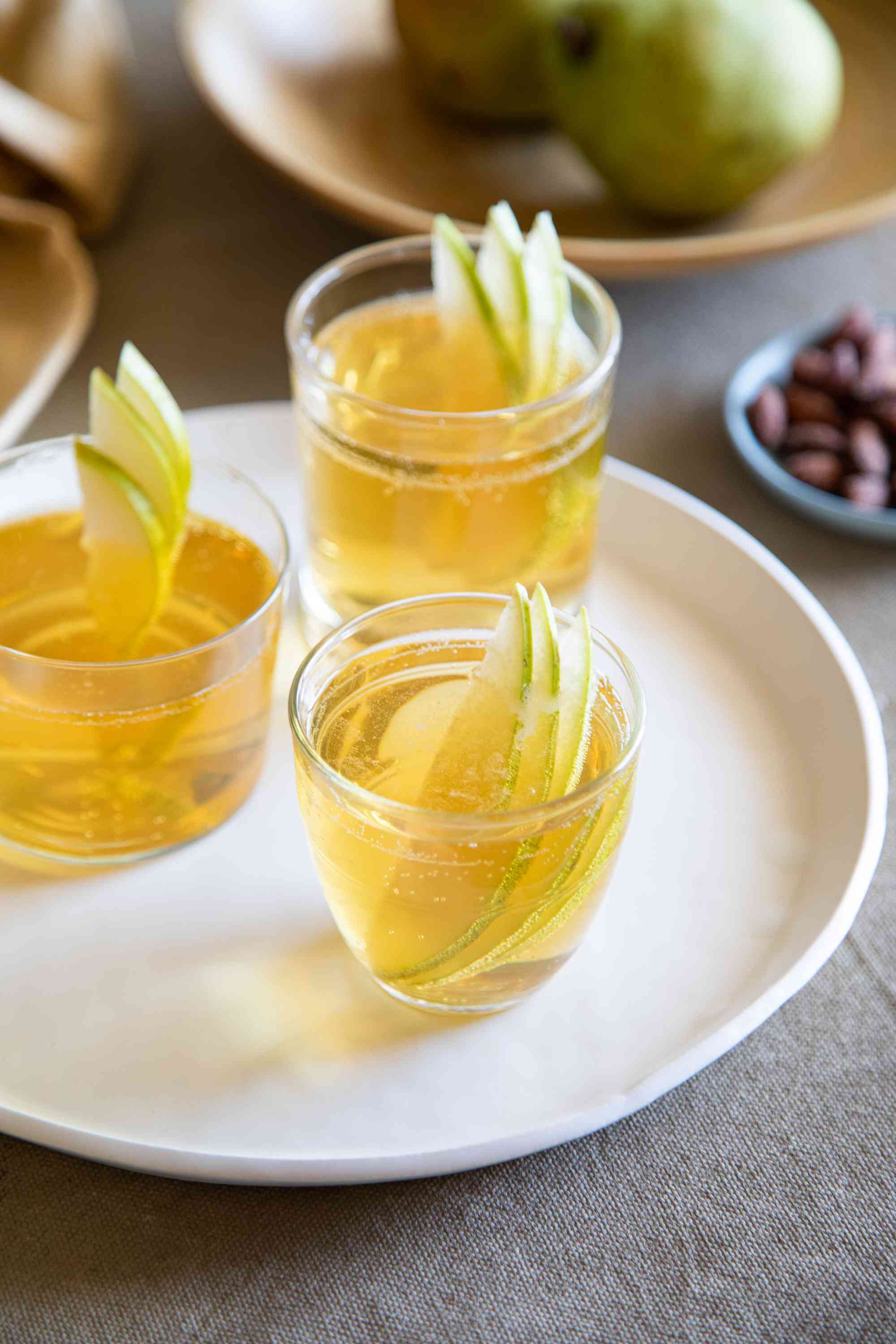 Side view of spiced pear bourbon punch.