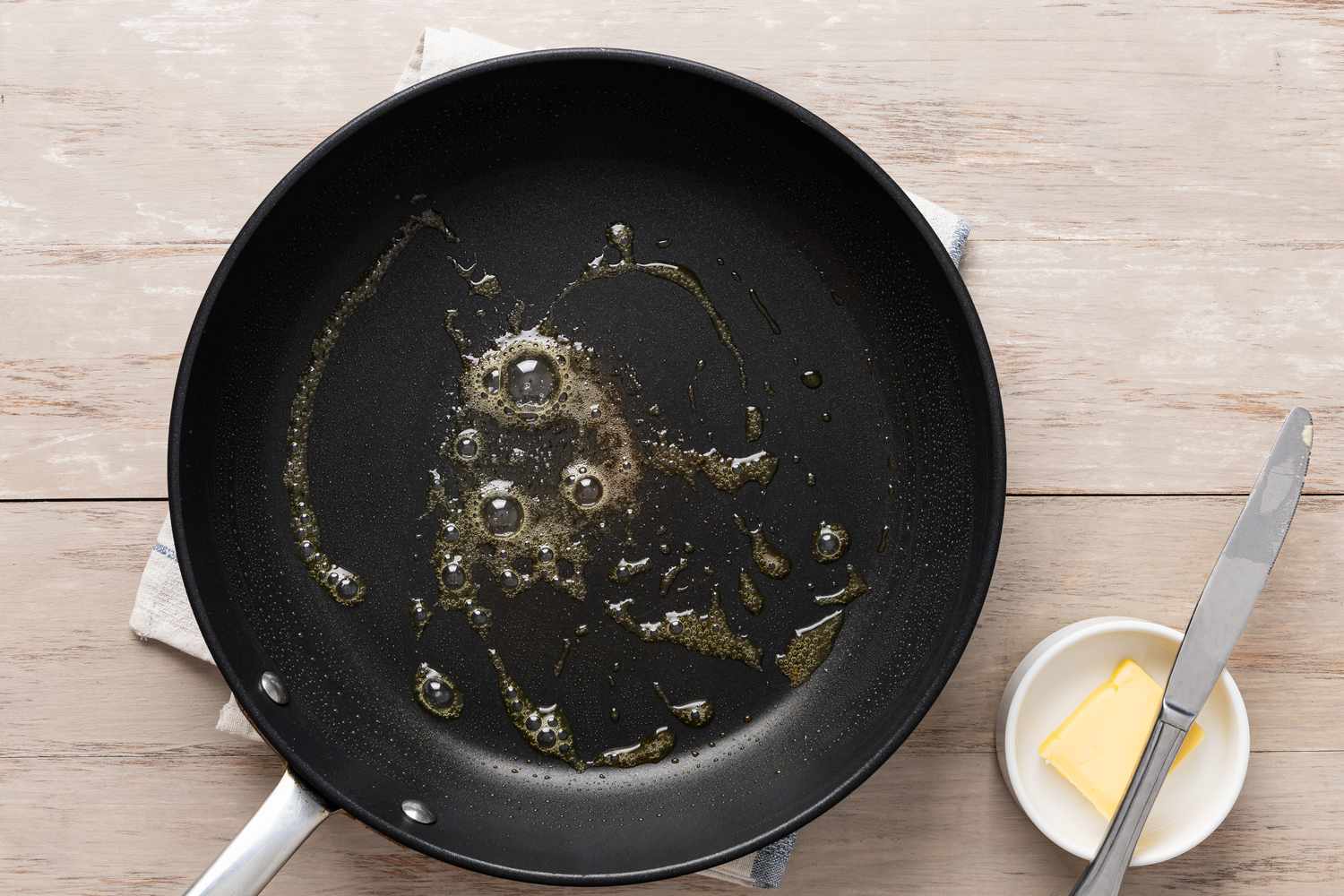 Melted butter on a skillet for Pannenkoeken (Dutch Pancakes) recipe
