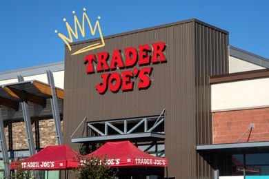 Trader Joes storefront with a crown illustration above the logo