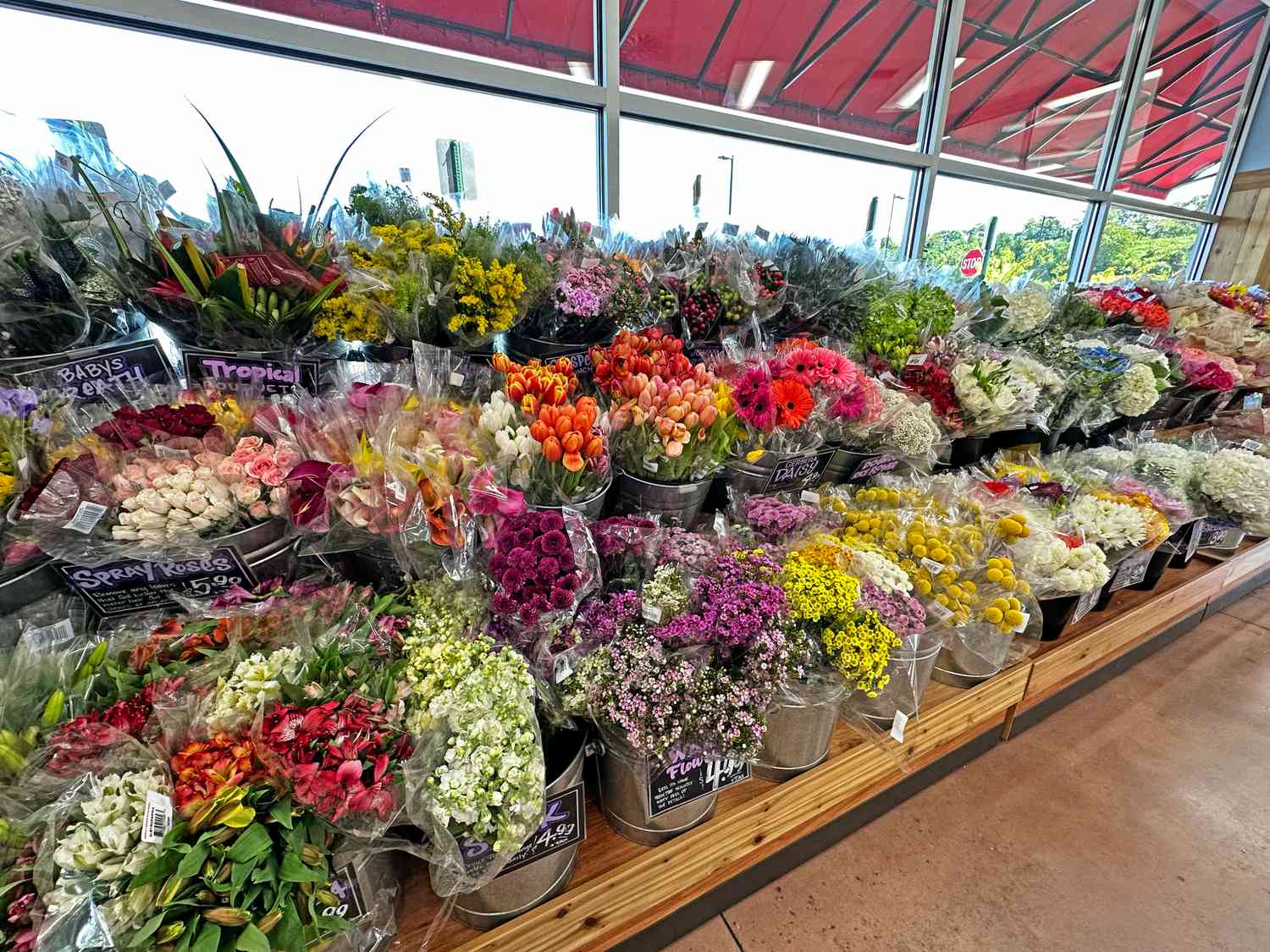 Buckets of Flowers Inside a Trader Joe's 
