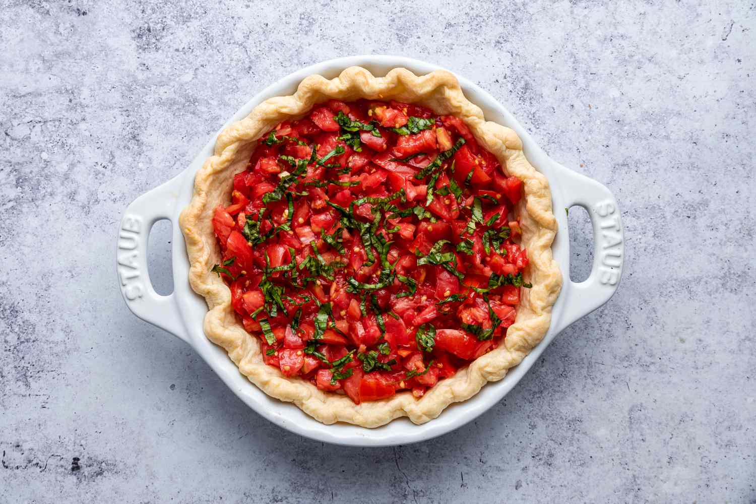 Tomatoes and Basil Added to Tomato Pie