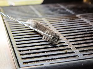 Grill Brush Used to Clean Gas Grill