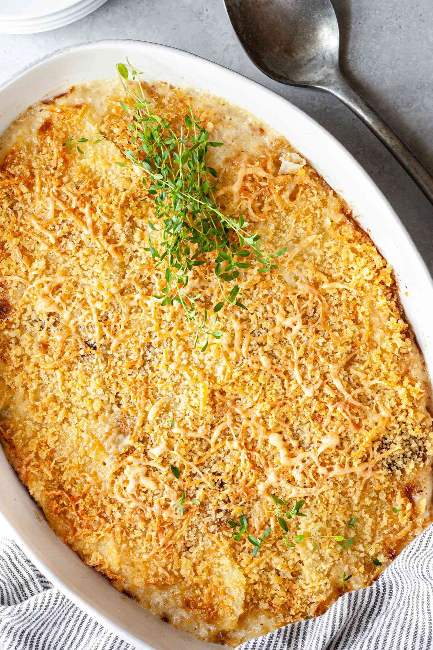 Potatoes Au Gratin in a Casserole Dish with Thyme