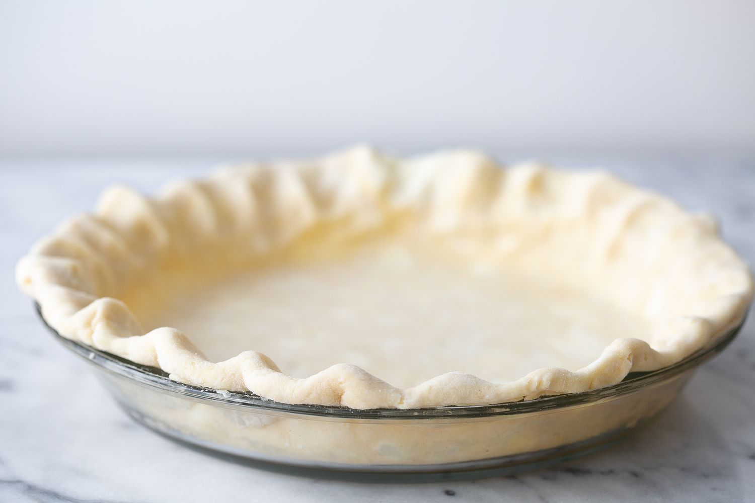 Uncooked All-Butter Pie Crust (Pate Brisee) in a Pie Pan 