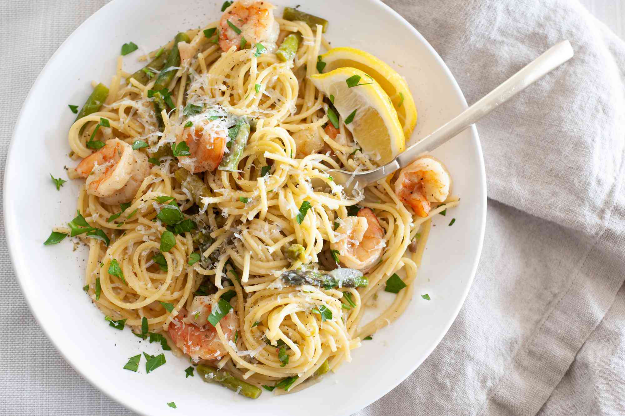 Shrimp and Asparagus Pasta on a Plate with a Fork