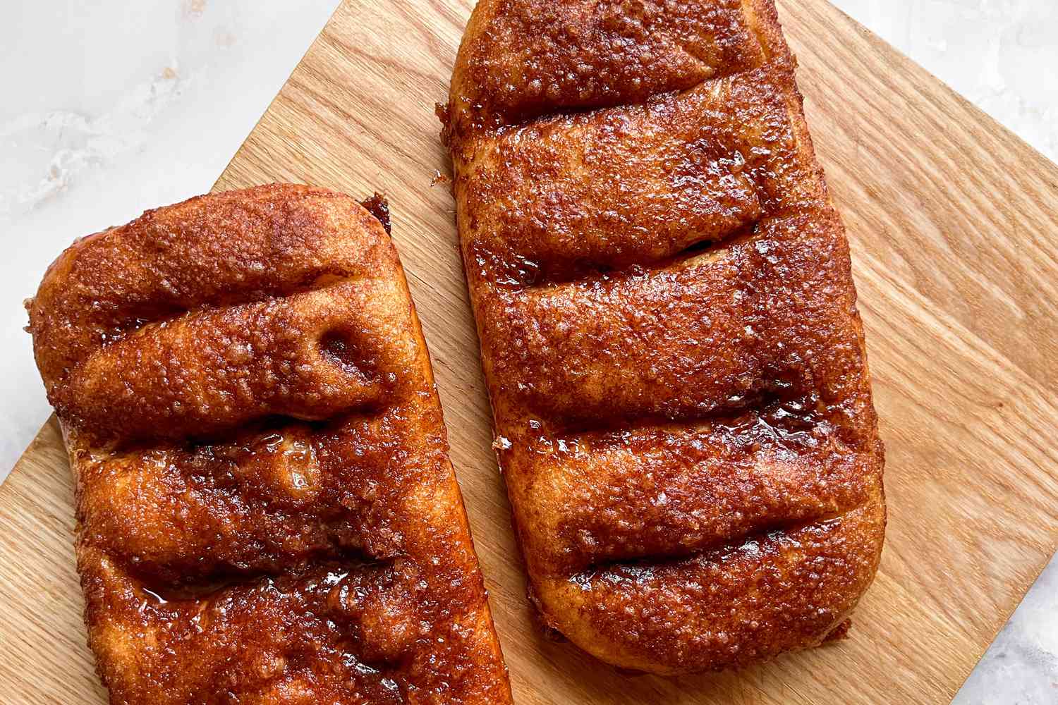 Dolly Parton's Cinnamon Bread on a wooden board