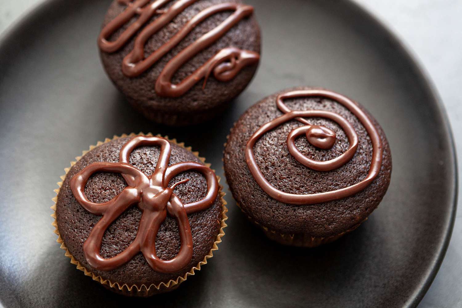 Easy cupcake recipe with cupcakes on a platter.