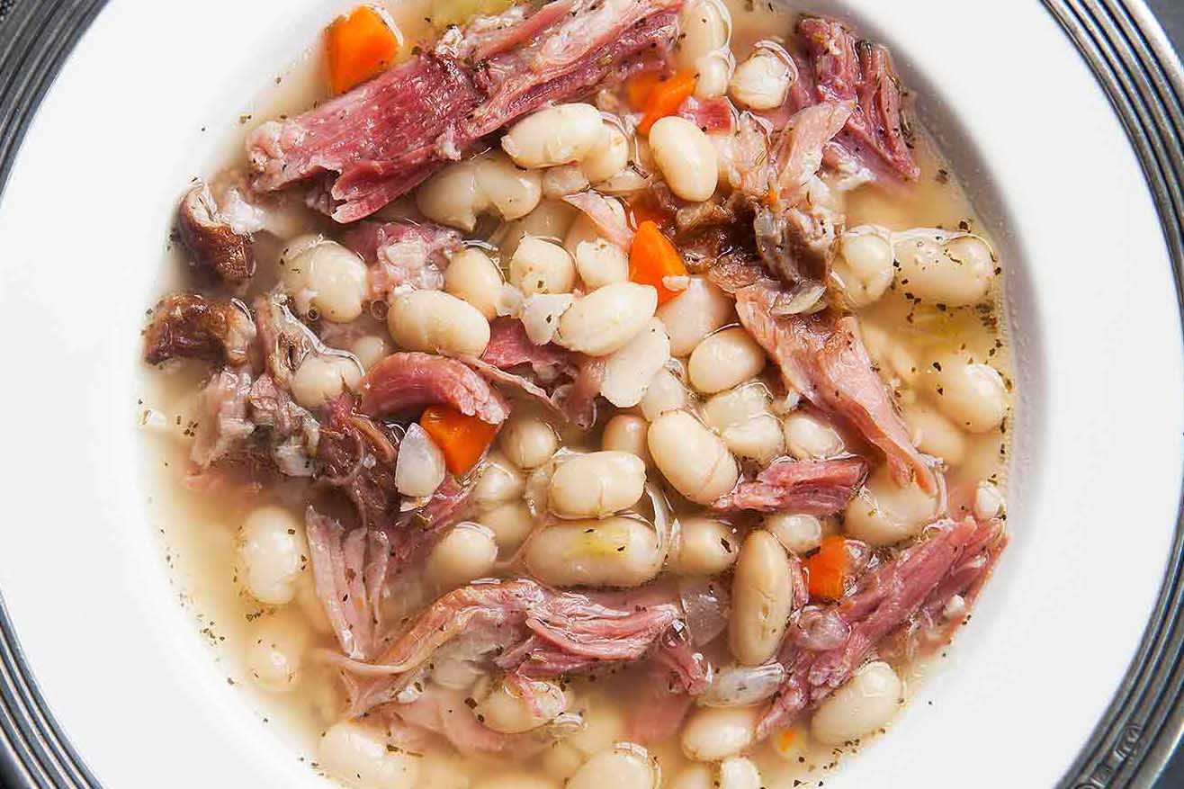 A bowl of white bean and ham soup