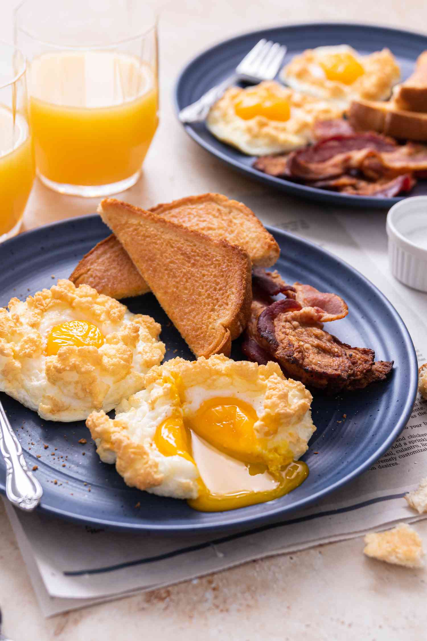 Cloud Eggs served on a plate at a breakfast table