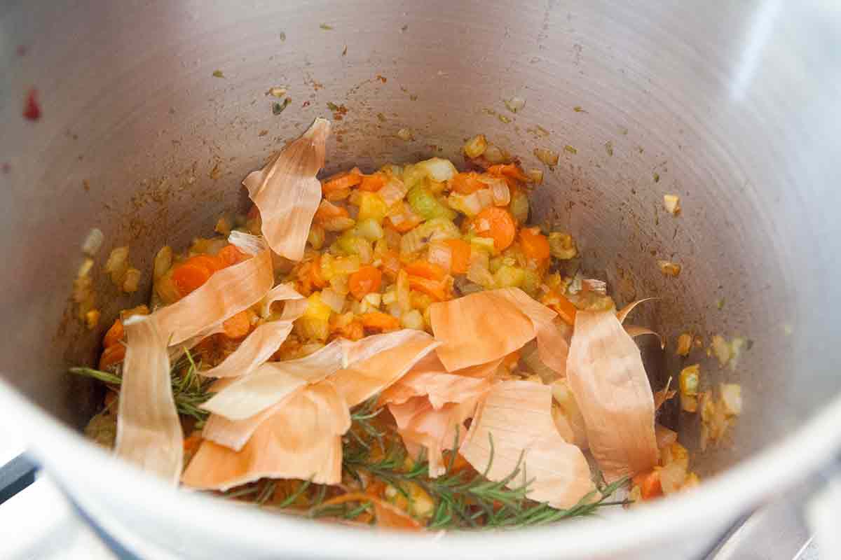a stockpot of vegetable scraps for stock