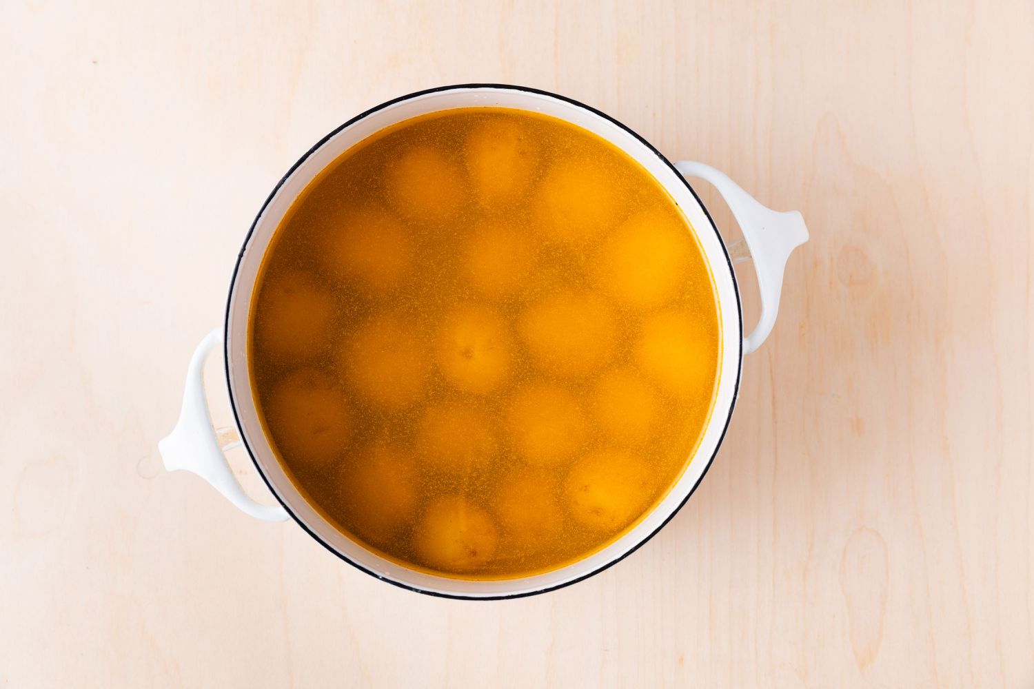 potatoes in a pot of water and seasonings for Bombay Aloo (Bombay Potatoes)