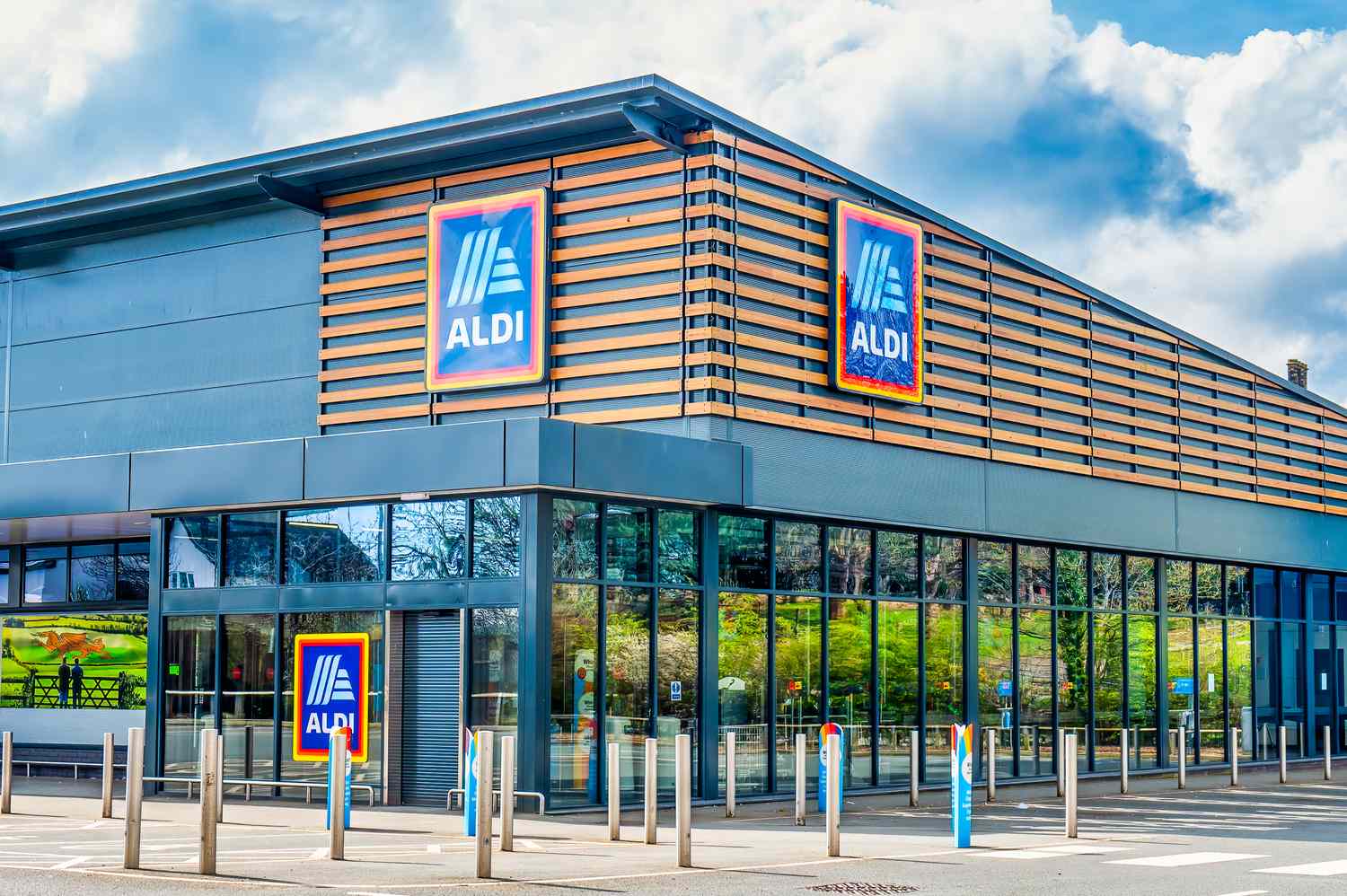 Exterior of an Aldi supermarket building with logo signage displayed