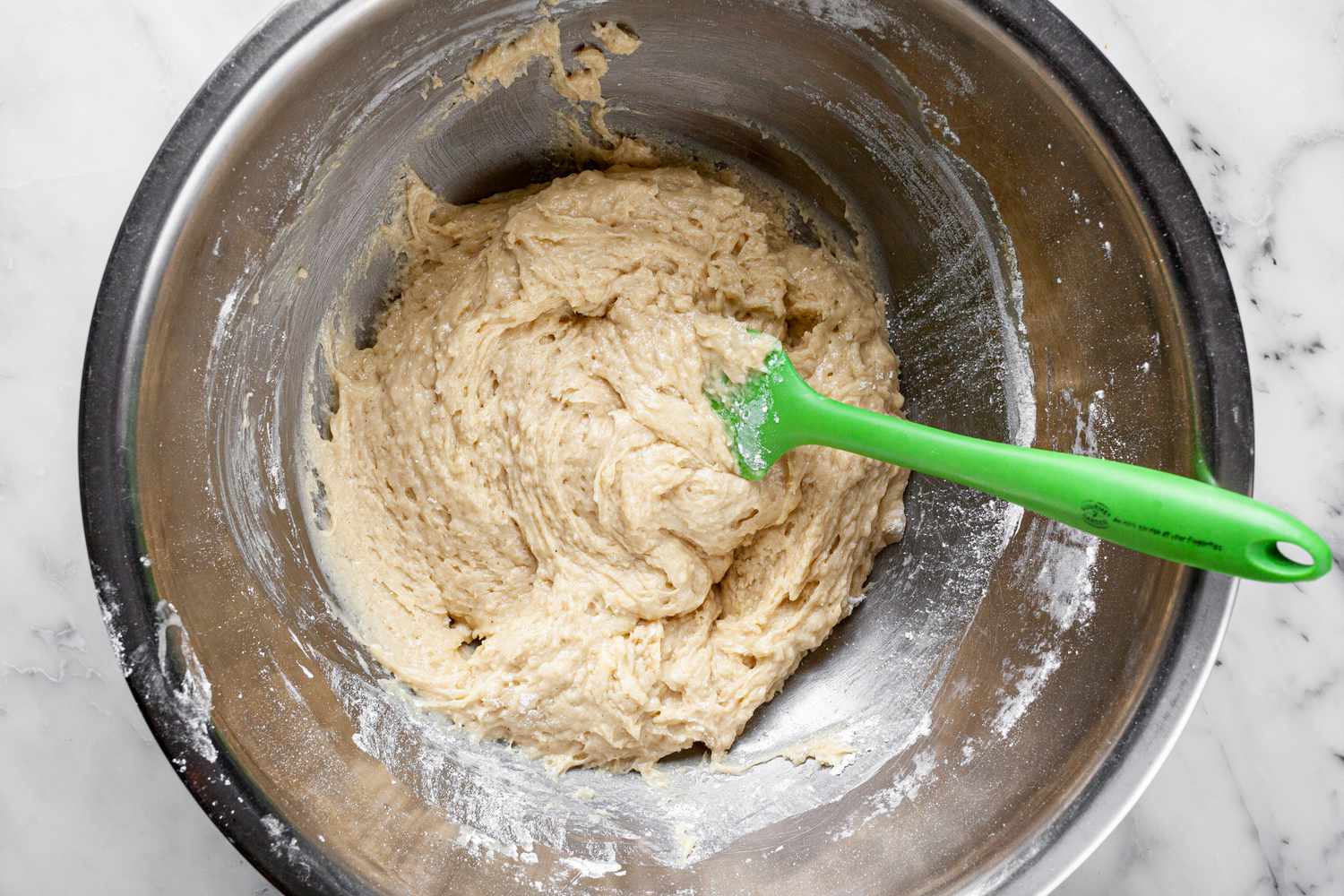 Blackberry Muffins Batter in a Bowl with a Spatula