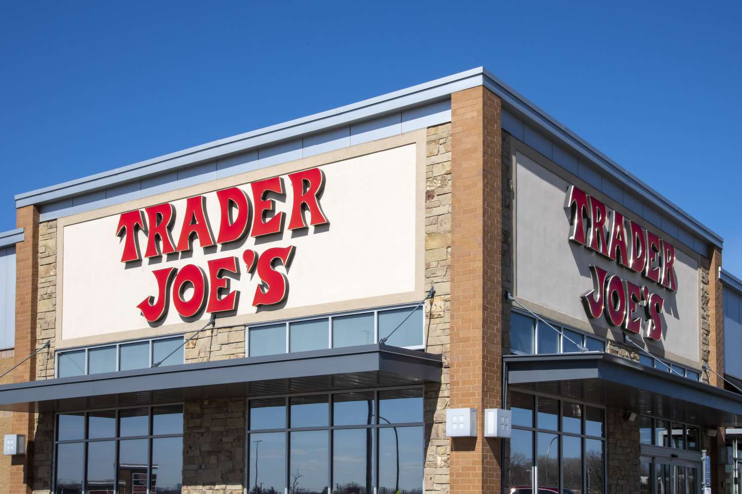 Trader Joes store exterior featuring the store name prominently on the building