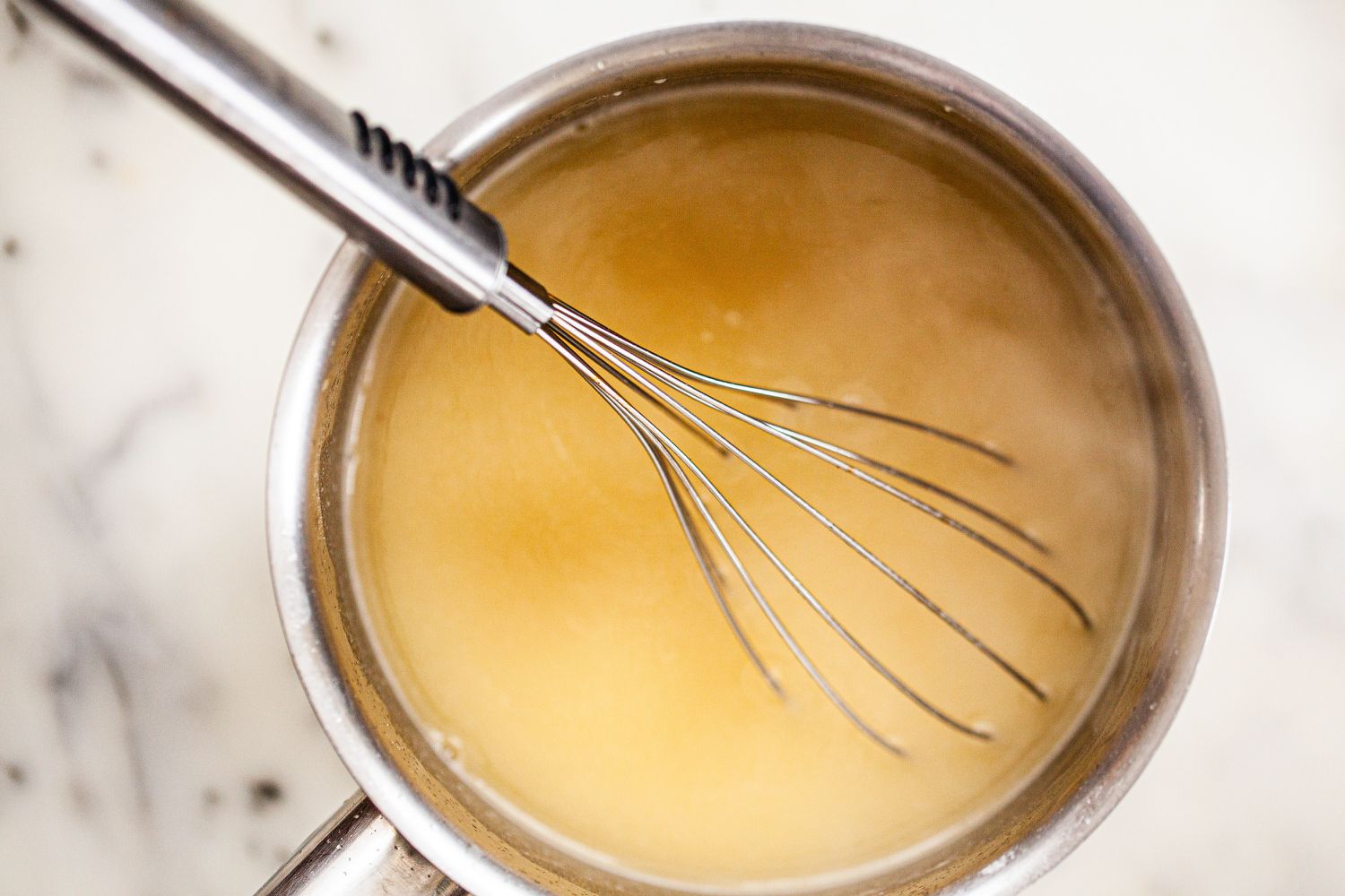 Whisk classic velouté sauce