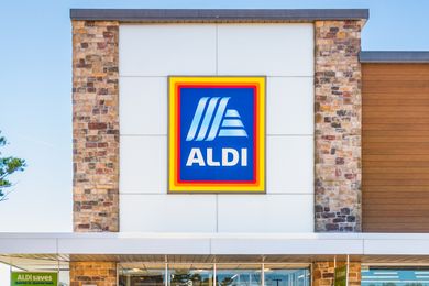 Facade of an Aldi store featuring the Aldi logo prominently displayed