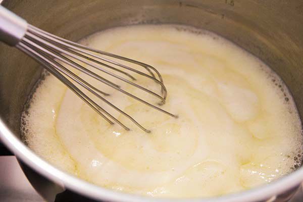 whisking browned butter for chocolate chunk cookies