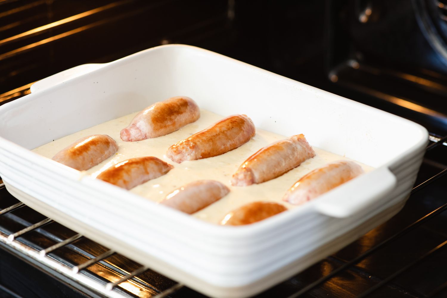 English sausages in batter to make a toad in the hole recipe.