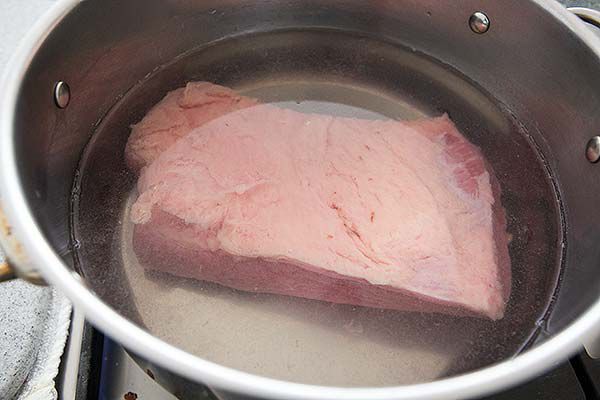 Removing sodium for baked corn beef by blanching first