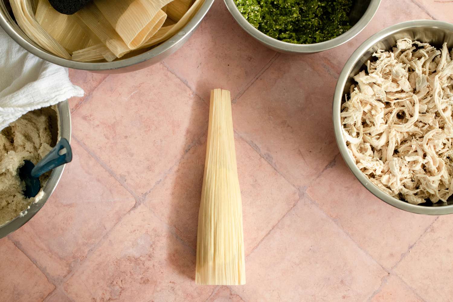 Making the Tamales: Corn Husk Folded Vertically in Half Again