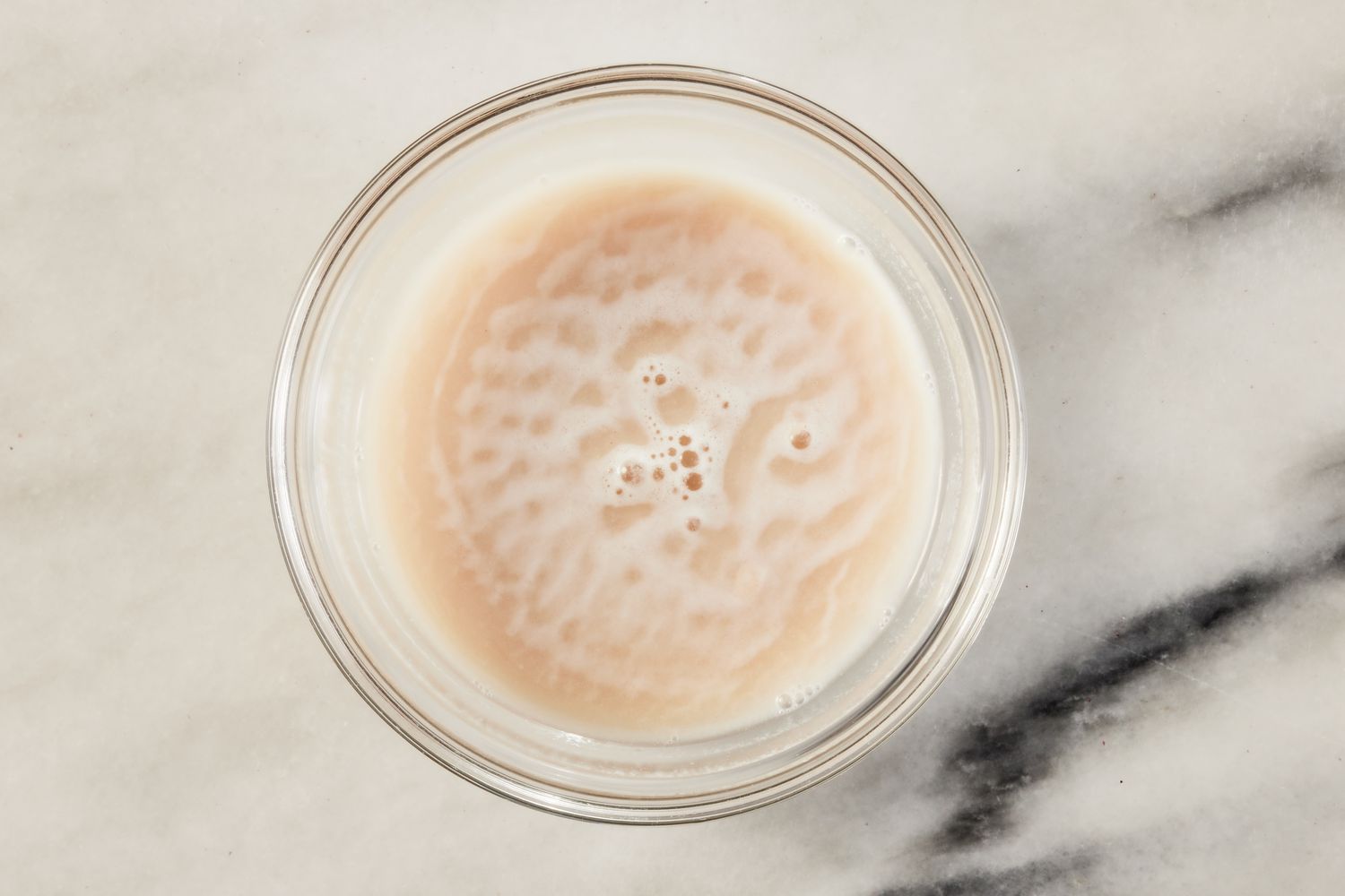 yeast blooming in a bowl for grandma pizza recipe