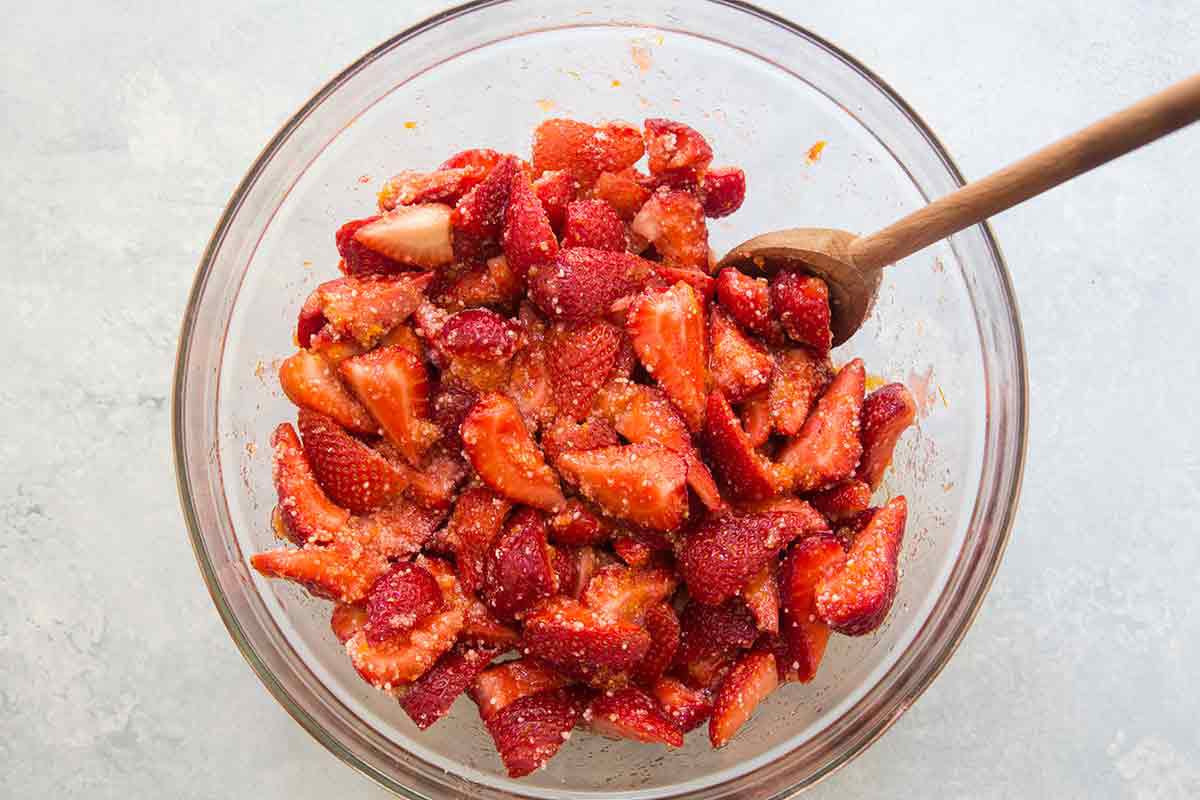 coat strawberries with sugar for american flag pie filling