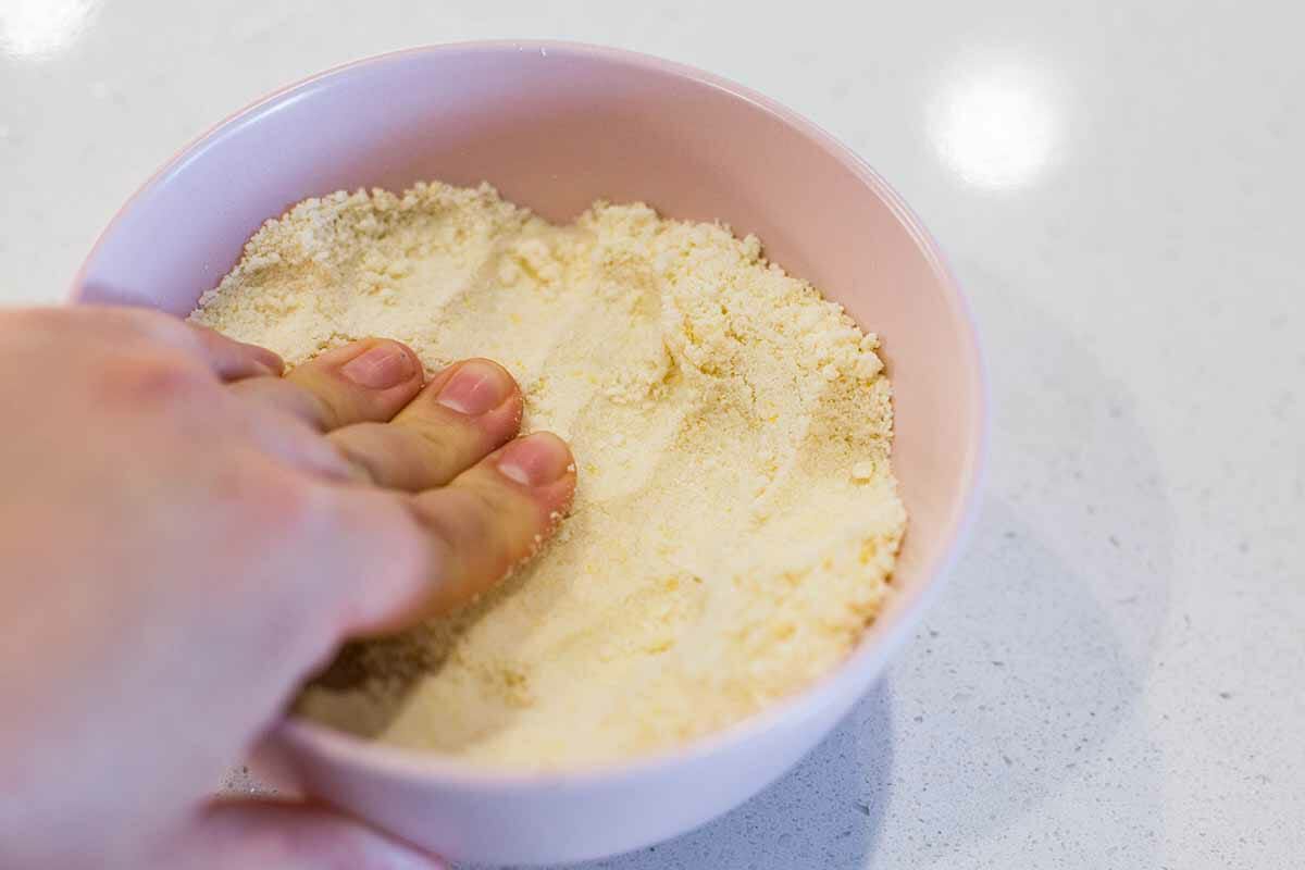 Crumb Bars Recipe with Blueberries press the top crust into a bowl and refrigerate